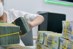 Kinh doanh - Ngân hàng trầy trật với nợ xấu