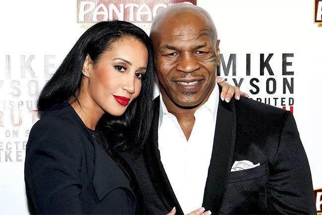 Mike Tyson and his wife at the premiere of the movie about Mike Tyson in California in 2013. Photo: Wire