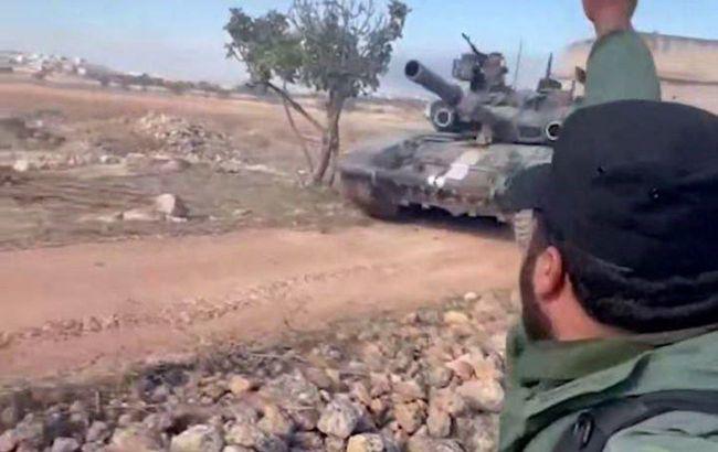 Phiến quân HTS sử dụng xe tăng trong cuộc tấn công mới nhất ở tỉnh Aleppo, Syria. Ảnh chụp màn hình từ video.