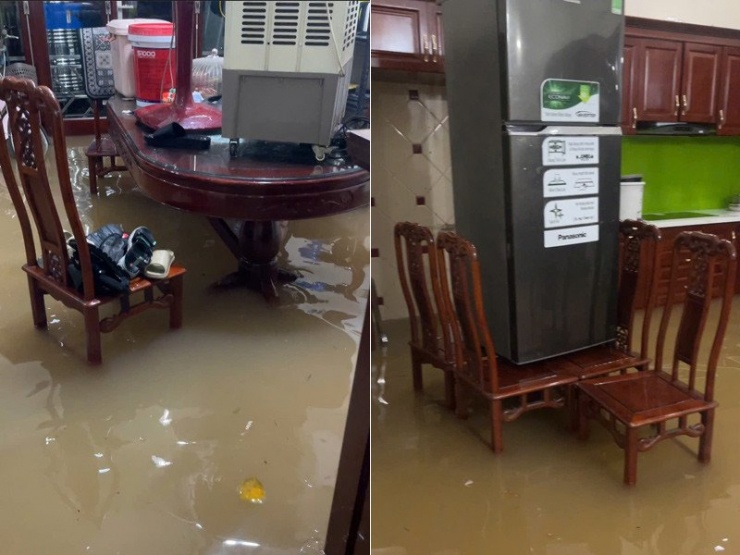 Chị Trang kê cao đồ đạc, tránh hư hỏng do ngập. Ảnh: NVCC