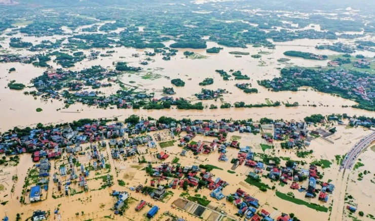 Trong 2 ngày 6-7/10, do ảnh hưởng hoàn lưu bão Matmo (bão số 11), tỉnh Thái Nguyên hứng chịu lượng mưa kỷ lục khiến nhiều nơi ngập lụt (Ảnh: Lê Khắc Duy- Dantri.com.vn).