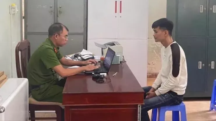 Trần Triệu Qúi tại cơ quan công an. Ảnh: C.A