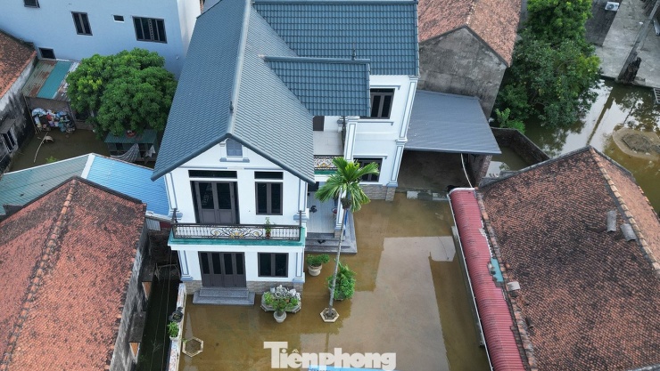 Những ngôi nhà trong biển nước ở ngoại thành Hà Nội - 7