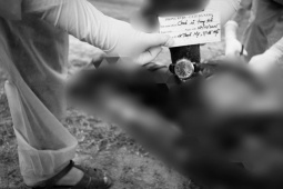 An ninh - Xã hội - Thi thể đeo ba lô chứa tảng đá nặng 20 kg nổi lên ở hồ thủy điện