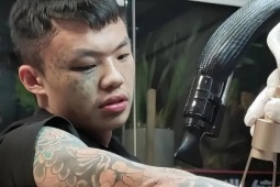 Cậu bé xăm kín mặt làm lại cuộc đời