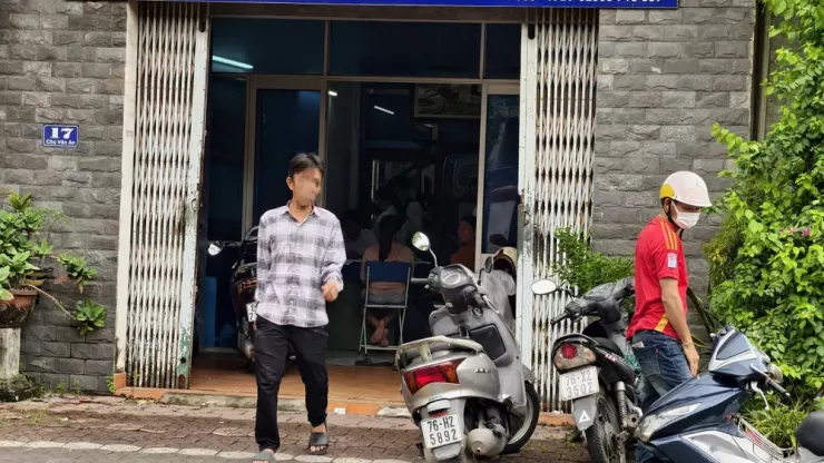 Chuyển công an giám định tờ vé số trúng 2 tỉ đồng bị rách ở Quảng Ngãi - 2