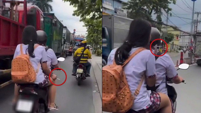Nữ sinh ngồi phía sau xe máy, không đội nón bảo hiểm, tay cầm điếu thuốc lá. Ảnh chụp màn hình