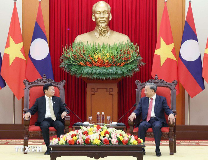 Tổng Bí thư Tô Lâm tiếp Tổng Bí thư, Chủ tịch nước Lào Thongloun Sisoulith nhân dịp tham dự Lễ mở ký Công ước của Liên hợp quốc về chống tội phạm mạng tại thủ đô Hà Nội. Ảnh: TTXVN