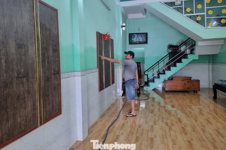 Cảnh tượng xót xa sau 3 đêm chạy lụt trở về: Nhà cửa nhuộm bùn, xơ xác - 23