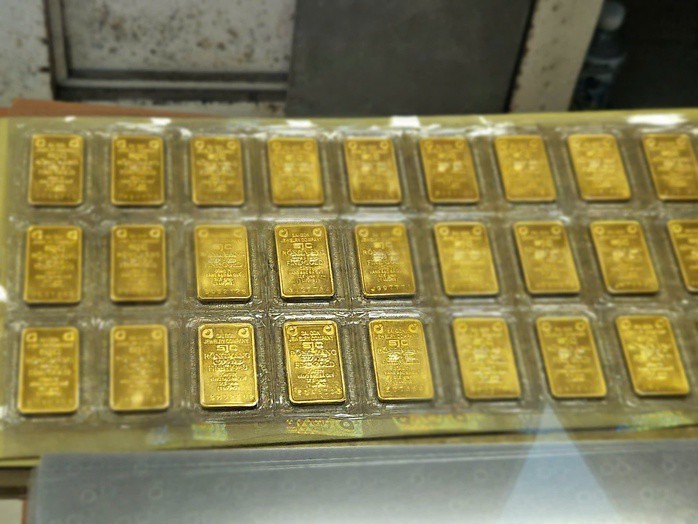Sáng 4-11, giá vàng miếng SJC và vàng nhẫn đồng loạt lao dốc - 1