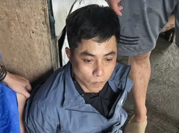 Nguyễn Tri Nghĩa lúc bị bắt. Ảnh: CA