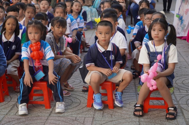 Học sinh Trường Tiểu học Phan Văn Trị (phường Cầu Ông Lãnh, TPHCM) trong lễ khai giảng năm học mới. Ảnh: Anh Nhàn