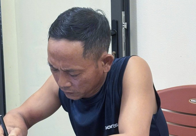 Bị can Tân tại cơ quan điều tra. Ảnh: Hùng Lê