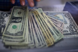 Đồng USD giảm giá khi hy vọng chính phủ Mỹ sắp mở cửa trở lại