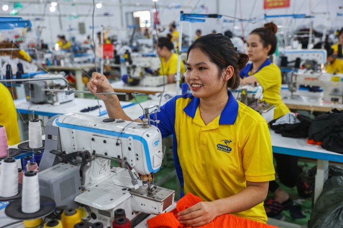 Công nhân làm việc tại công ty may mặc ở xã Vĩnh Lộc A, TP HCM, tháng 8/2025. Ảnh: Quỳnh Trần
