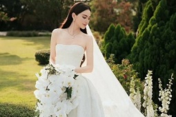 Mai Davika diện váy cưới đính 1.700 cánh bướm