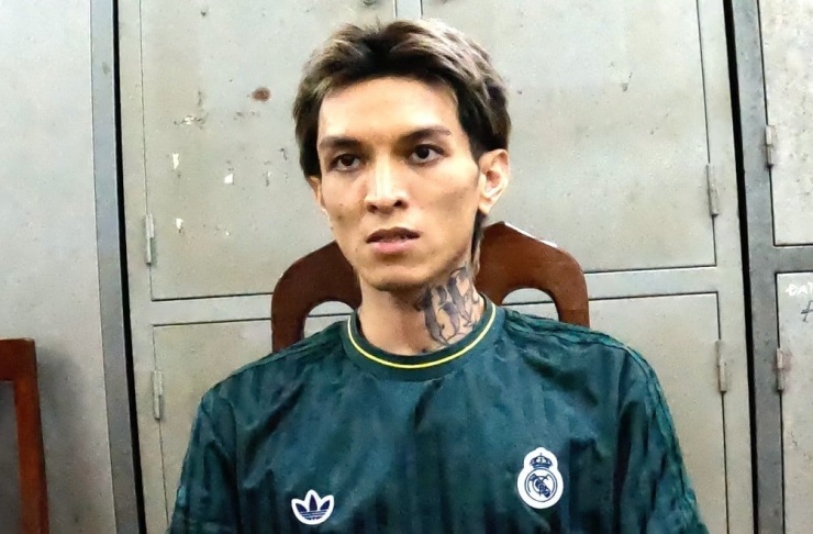 Bình Gold trong buổi làm việc với công an. Ảnh: Công an TP Hà Nội