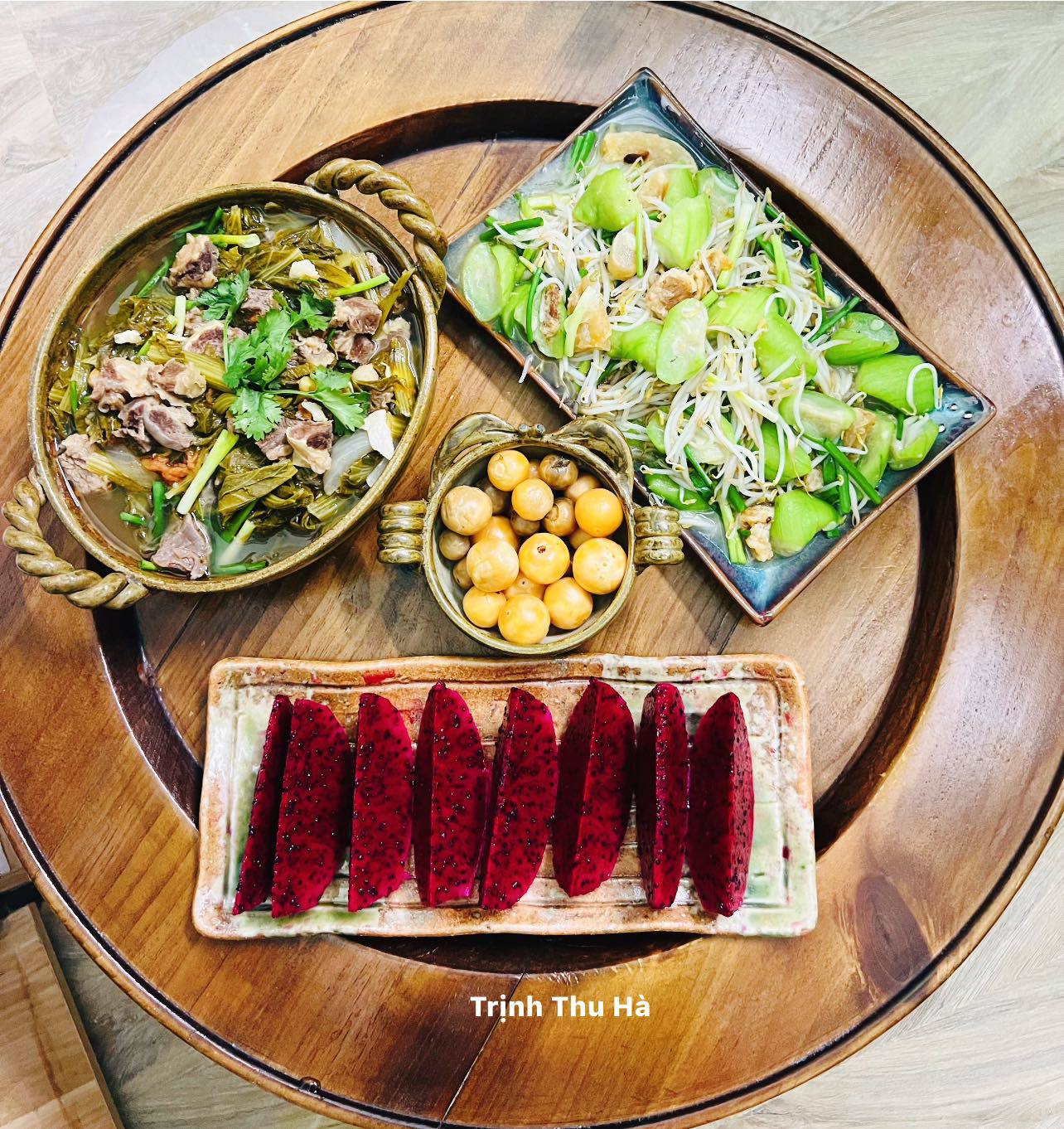 Canh sườn bò dưa chua - Mướp giá xào tóp mỡ - Cà muối - Thanh long đỏ