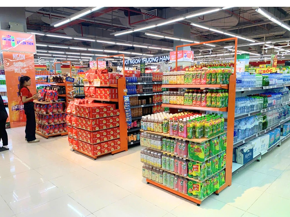 Các hệ thống bán lẻ đồng loạt nâng cấp kệ để hàng, sẵn sàng đón Tết - 3