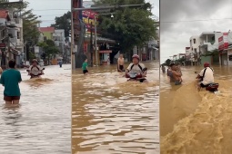 Xe máy - Xe đạp - Clip: Khó tin cảnh người đàn ông phóng xe máy bon bon qua đoạn đường ngập