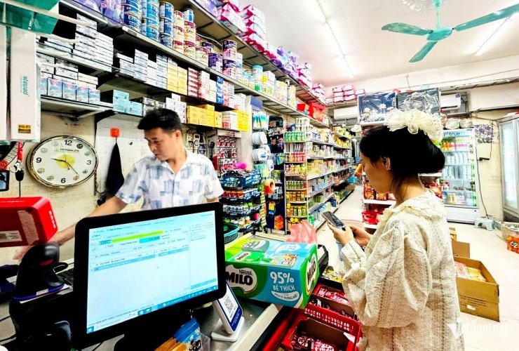 Nhiều hộ kinh doanh lo lắng về ngưỡng doanh thu nộp thuế từ 200 triệu đồng, áp dụng từ năm 2026. Ảnh: Nguyễn Lê