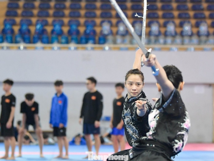 SEA Games 33: Chiêm ngưỡng thần thái đầy mê hoặc của các tuyển thủ wushu Việt Nam - 8