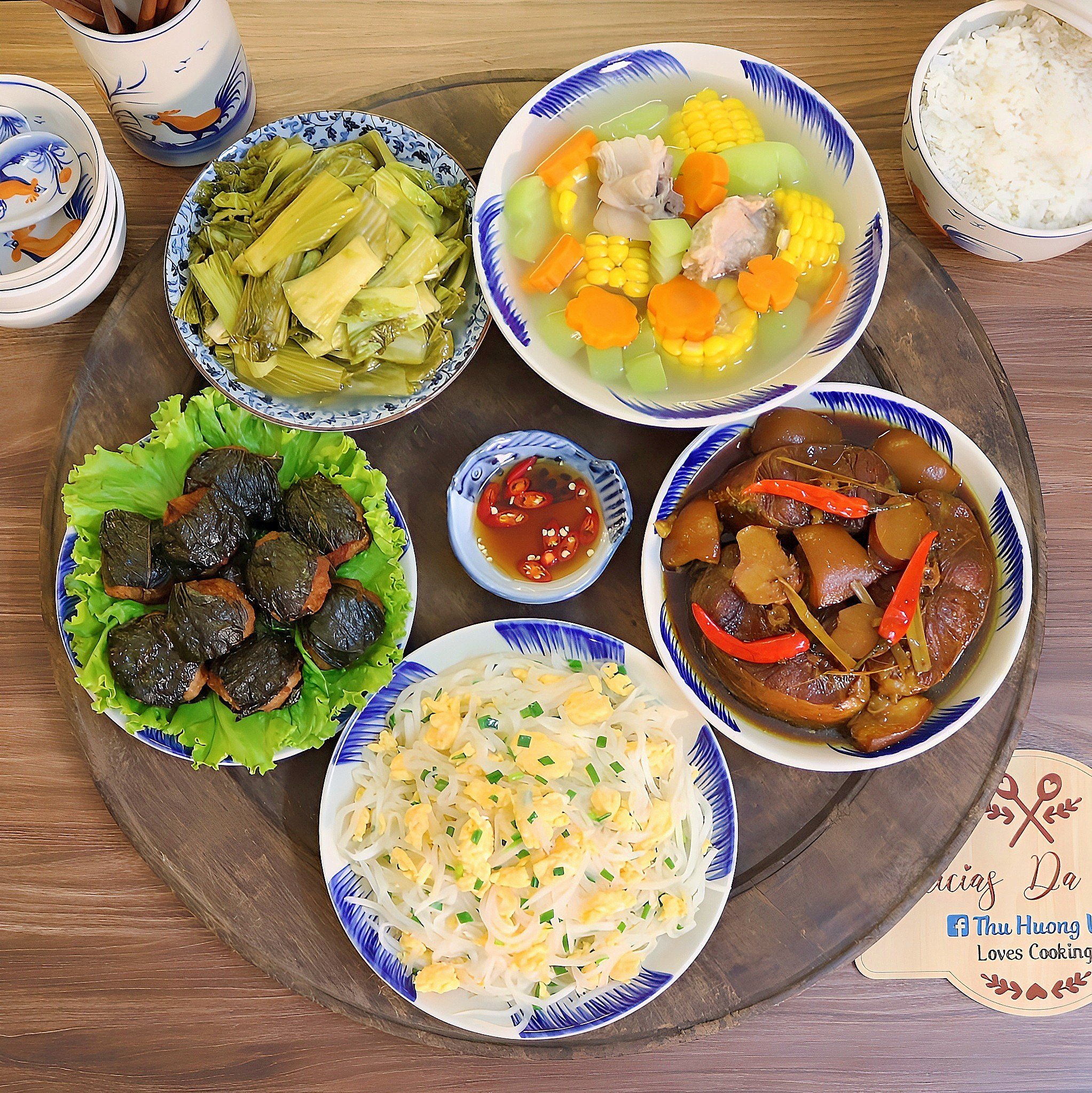 Chả xương sông lá lốt - Cá trắm đen kho riềng - Củ cải xào trứng - Canh rau củ nấu sườn - Dưa cải muối