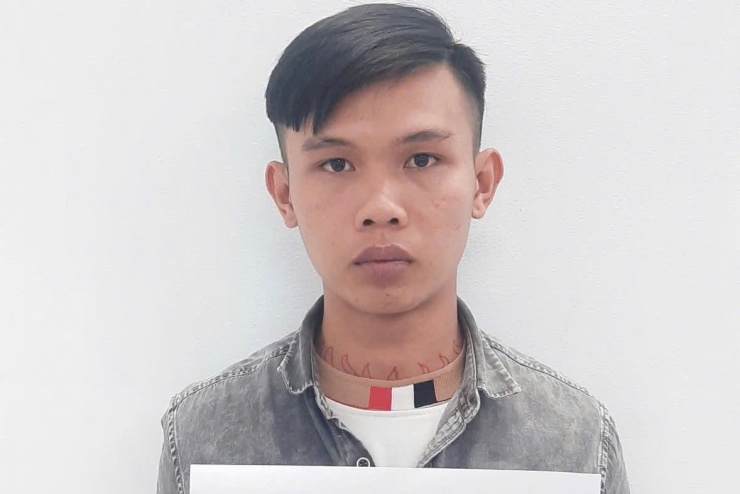 Đối tượng Nguyễn Võ Hoài Nhớ tại cơ quan công an. Ảnh: AH