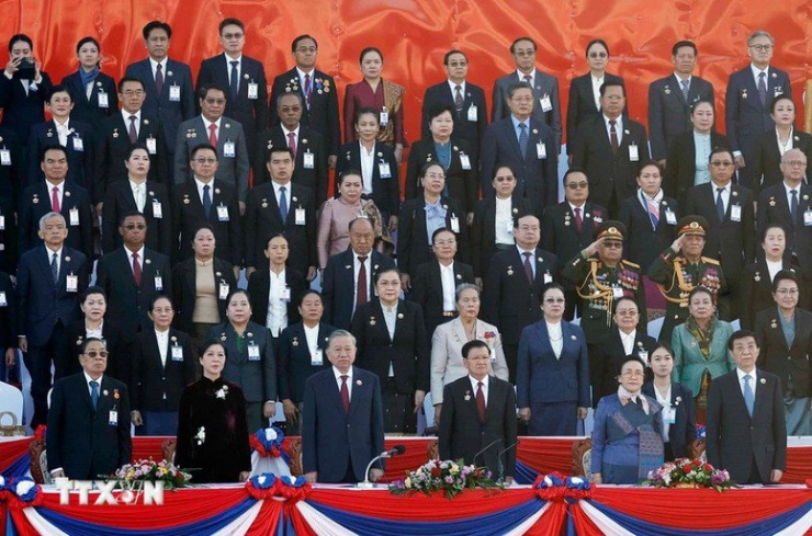 Tổng Bí thư Tô Lâm và Phu nhân cùng các đại biểu dự Lễ kỷ niệm 50 năm Quốc khánh Lào và 105 năm Ngày sinh Chủ tịch Kaysone Phomvihane. Ảnh: TTXVN