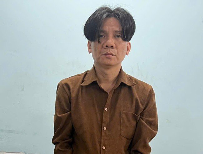 Nguyễn Quốc Huy tại cơ quan công an.