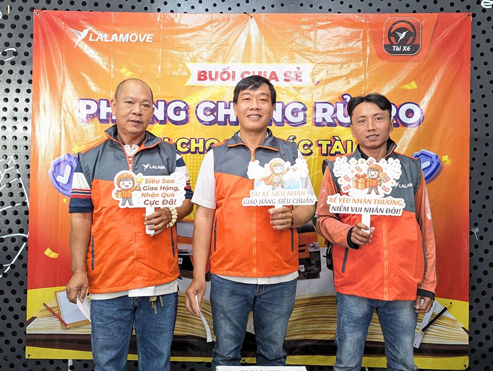 Đối tác tài xế bày tỏ niềm vui khi tham dự buổi chia sẻ do Lalamove tổ chức. Ảnh: LLM