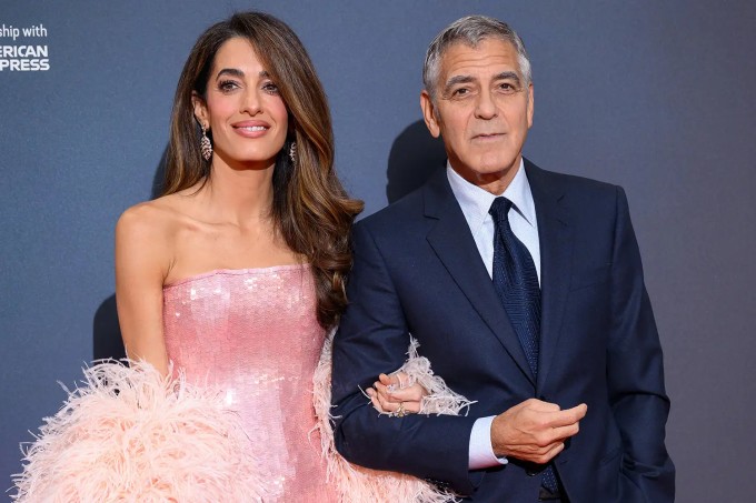 George Clooney và bà xã, luật sư Amal Clooney. Ảnh: Wire
