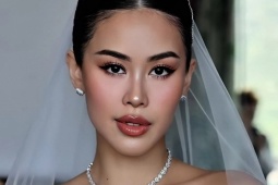 Tiên Nguyễn chọn váy cưới tôn vòng một