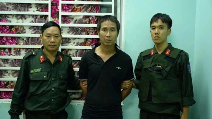 Lê Sỹ Tùng (giữa) bị xác định đủ năng lực trách nhiệm hình sự. Ảnh:Thái Hà