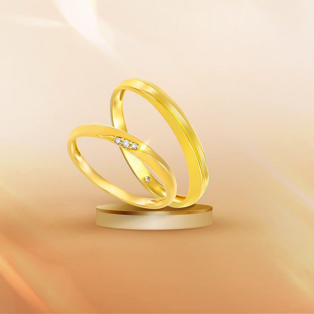 Nhẫn cưới kim cương vàng 14K có thiết kế thanh mảnh, dễ mang hàng ngày. Ảnh: PNJ.