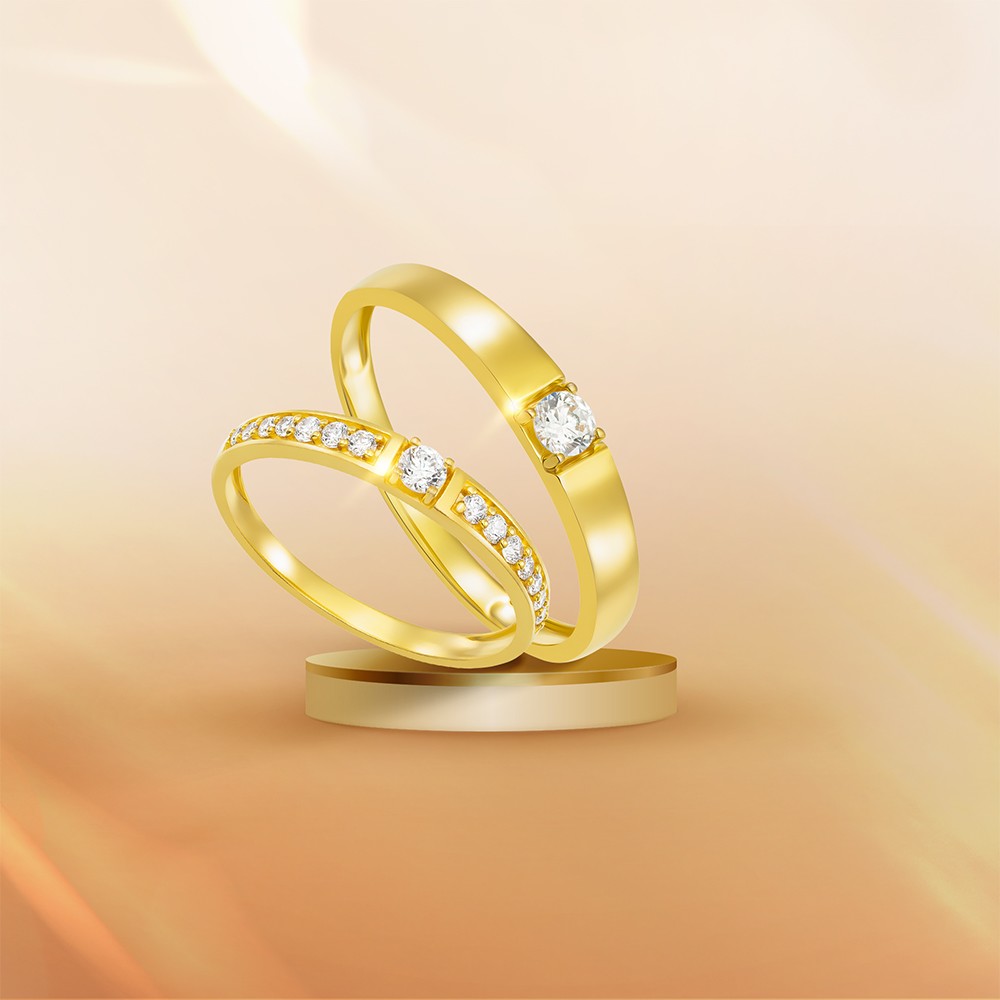 Điểm nhấn đá ECZ ở vị trí trung tâm giúp nhẫn cưới vàng 14K thêm nổi bật. Ảnh: PNJ.