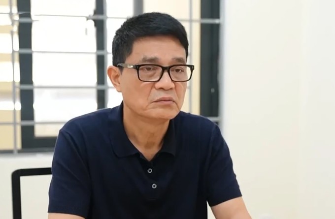 Cựu Cục trưởng Nguyễn Thanh Phong khi bị bắt. Ảnh: VTV