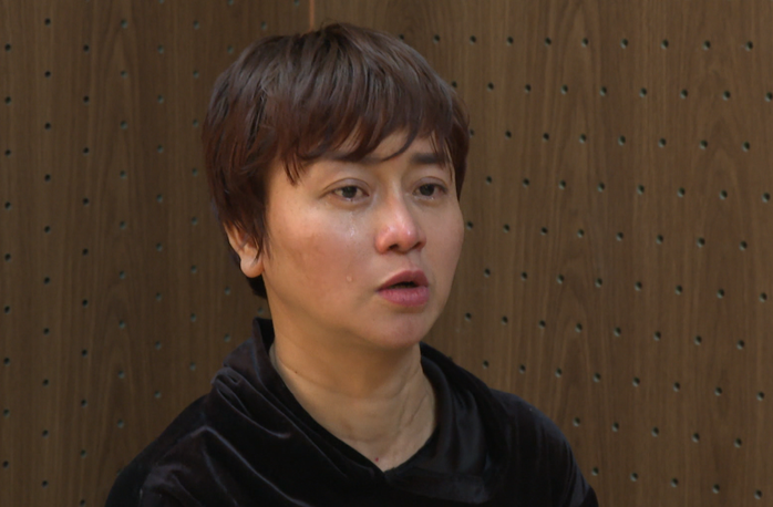 Nguyễn Thị Thu cho biết lý do trở về là để làm lại giấy tờ vào viện chăm sóc con trai đang ốm đau