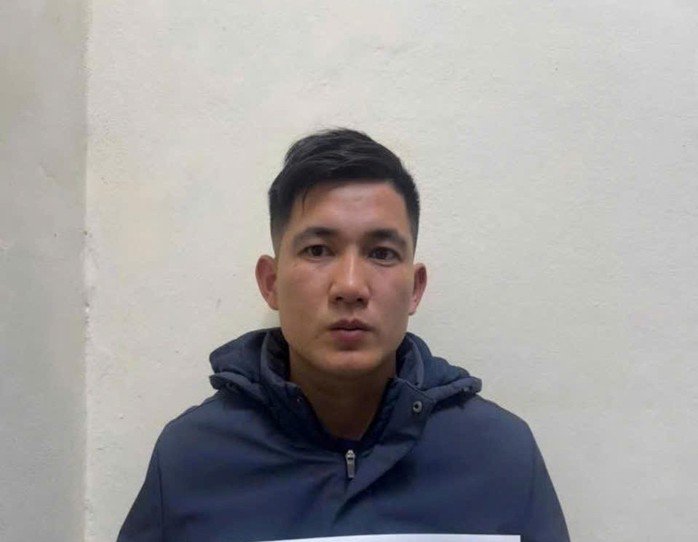 Đỗ Quang Long tại cơ quan công an. Ảnh: Công an cung cấp