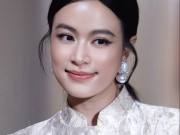 Hoàng Thùy Linh U40 diện đồ kín đáo, ghi điểm với vẻ đẹp cổ điển