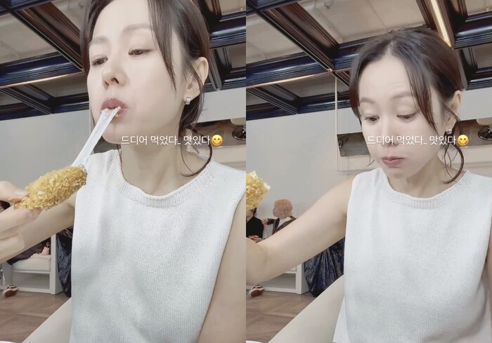 Son Ye Jin chia sẻ khoảnh khắc ăn phô mai que. Ảnh: Nate