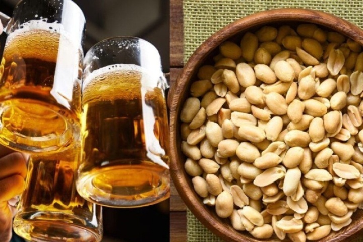 Vì sao khi uống rượu bia không nên dùng lạc làm mồi nhậu?