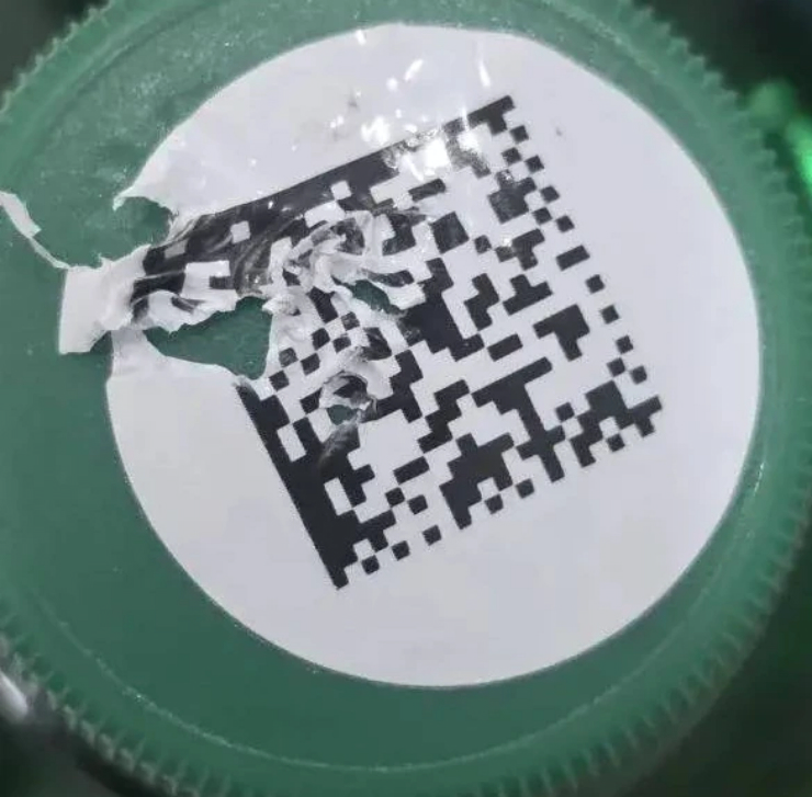 Hình minh họa một đoạn mã QR bị rách.